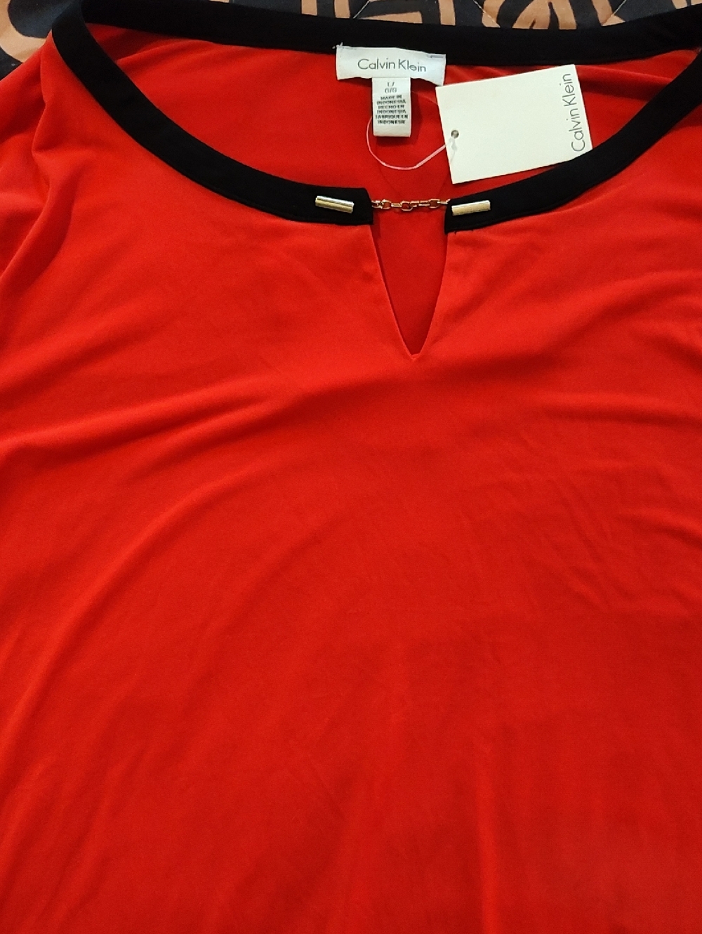 Calvin Klein Red Blouse with Black Trim and Gold Chain